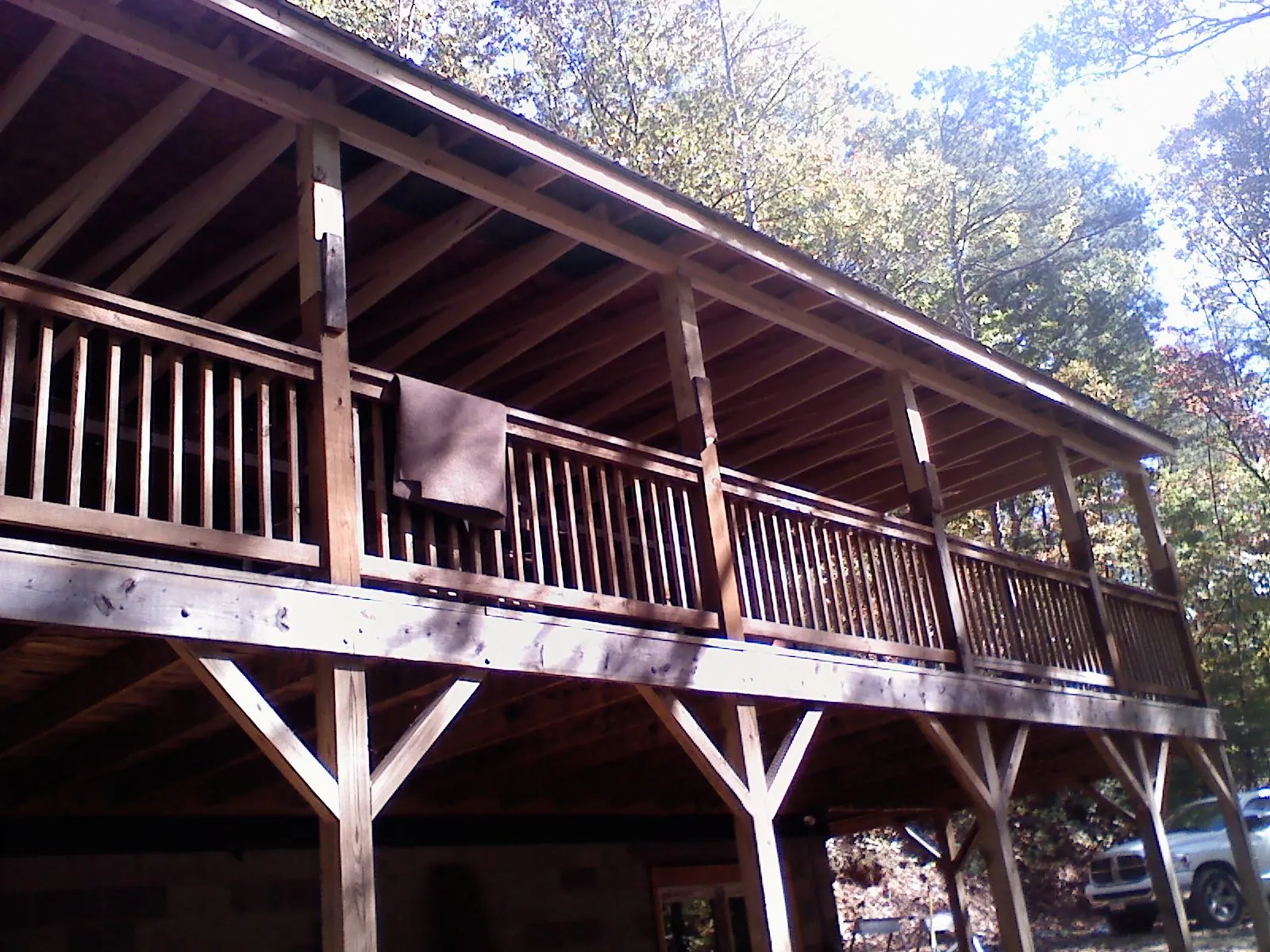 Timber framing under a new elevated porch and deck — Roof Leak Repair in El Granada by Roofing Brothers